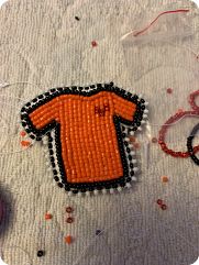 beaded orange shirt